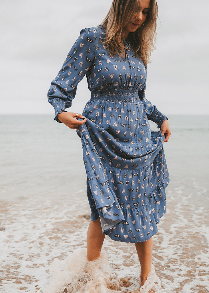 night-butterfly-blue-shirred-dress.jpg